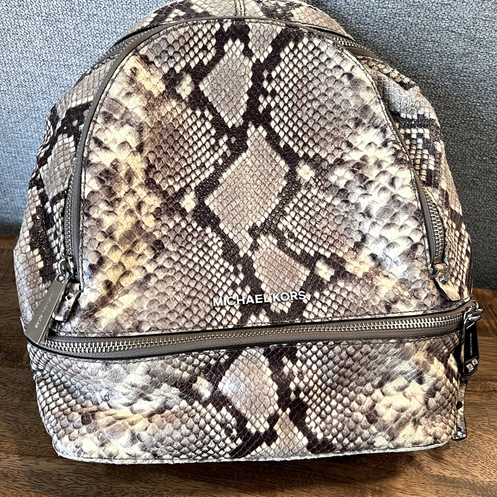 Michael Kors Snake leather backpack.